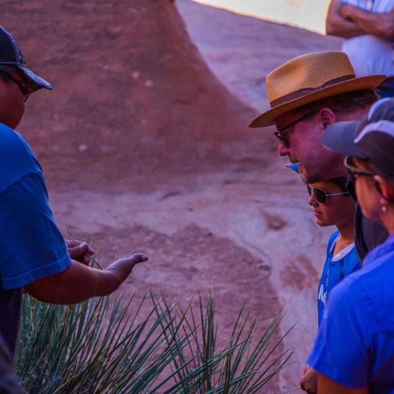 Tour guide showing plants