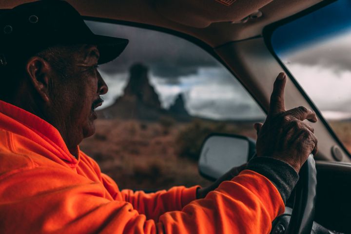 a man driving a car