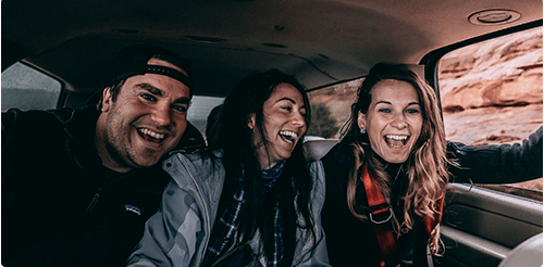 Happy People Smiling in Car