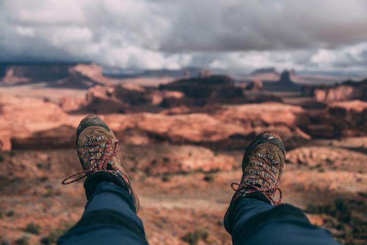 a person standing on top of a mountain