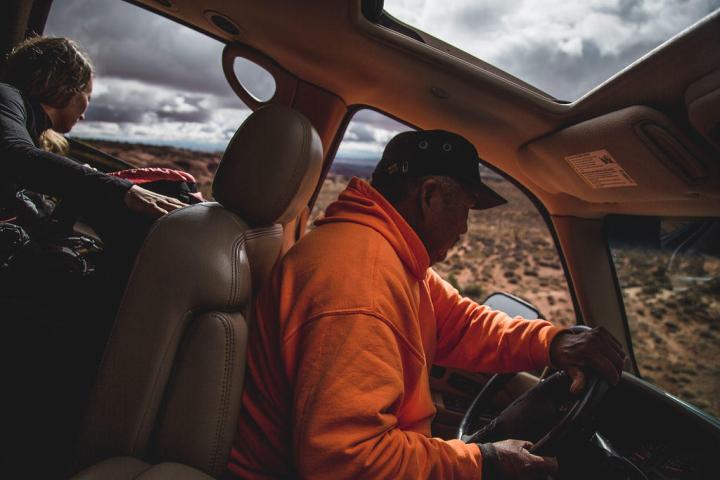 a man sitting in a car