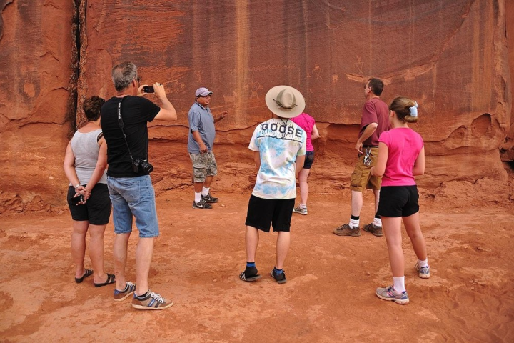 a group of people standing on a court